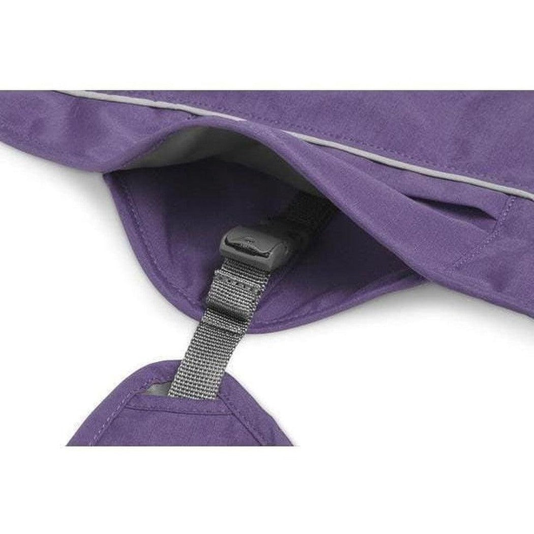 A close-up of the Ruffwear Overcoat Fuse Jacket in Cedar Green showing the adjustable strap and gray trim against a white background.