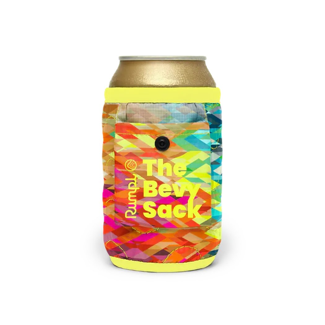 A front view of the Rumpl Bevy Sack in Baja Fade with a colorful geometric pattern and yellow trim, against a white background.