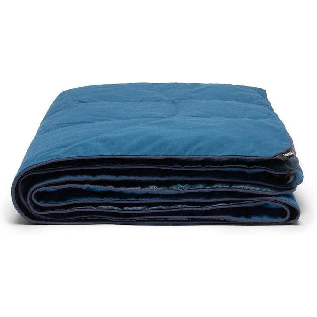 A folded Deepwater Rumpl Nanoloft Puffy Flame Blanket sits against a white background.