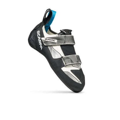 A side view of the Scarpa Women's Quantic climbing shoe in Dust Grey/Black with two straps and a blue pull tab against a white background.