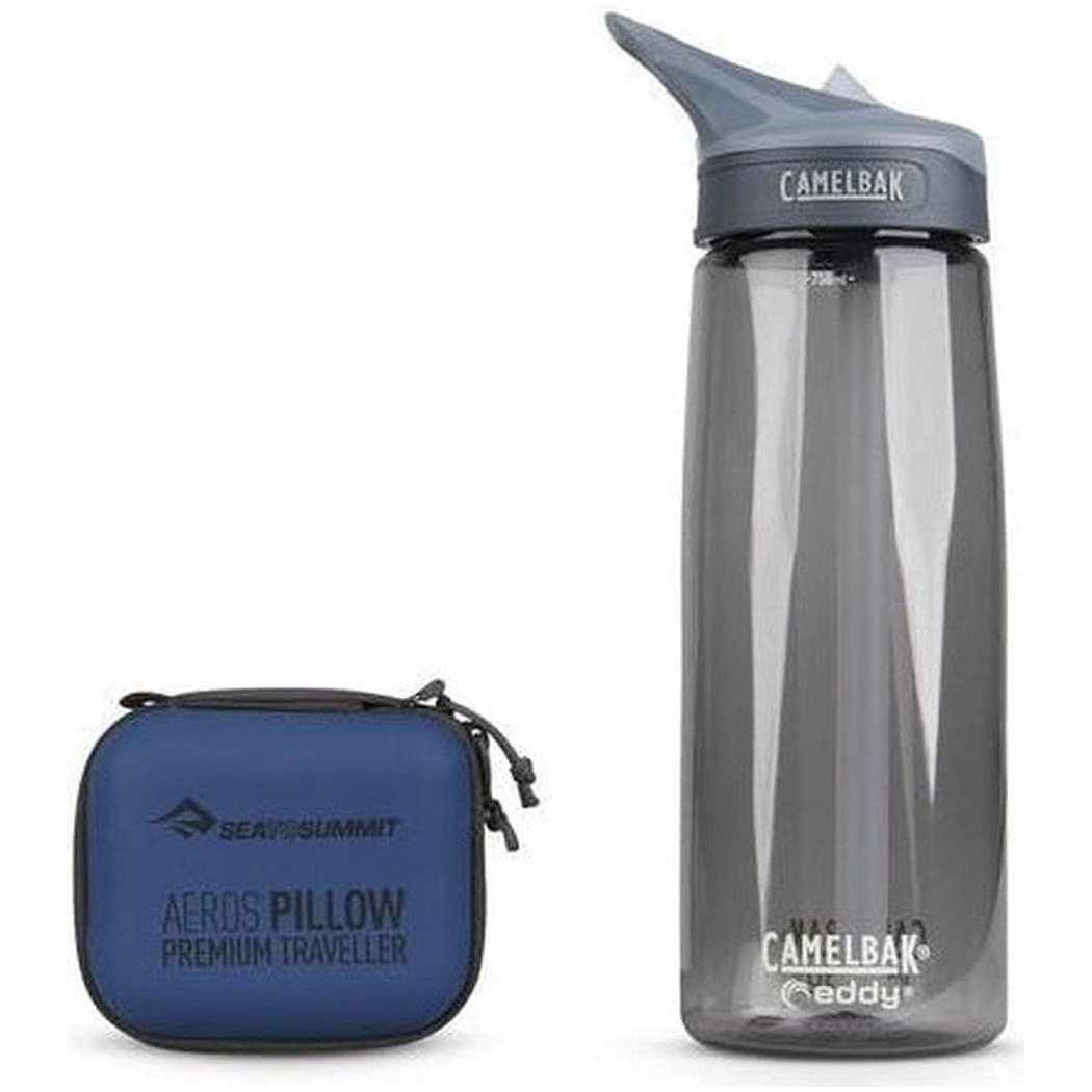 A blue Sea To Summit Aeros Pillow Premium Traveller case sits next to a charcoal CamelBak water bottle on a white background.
