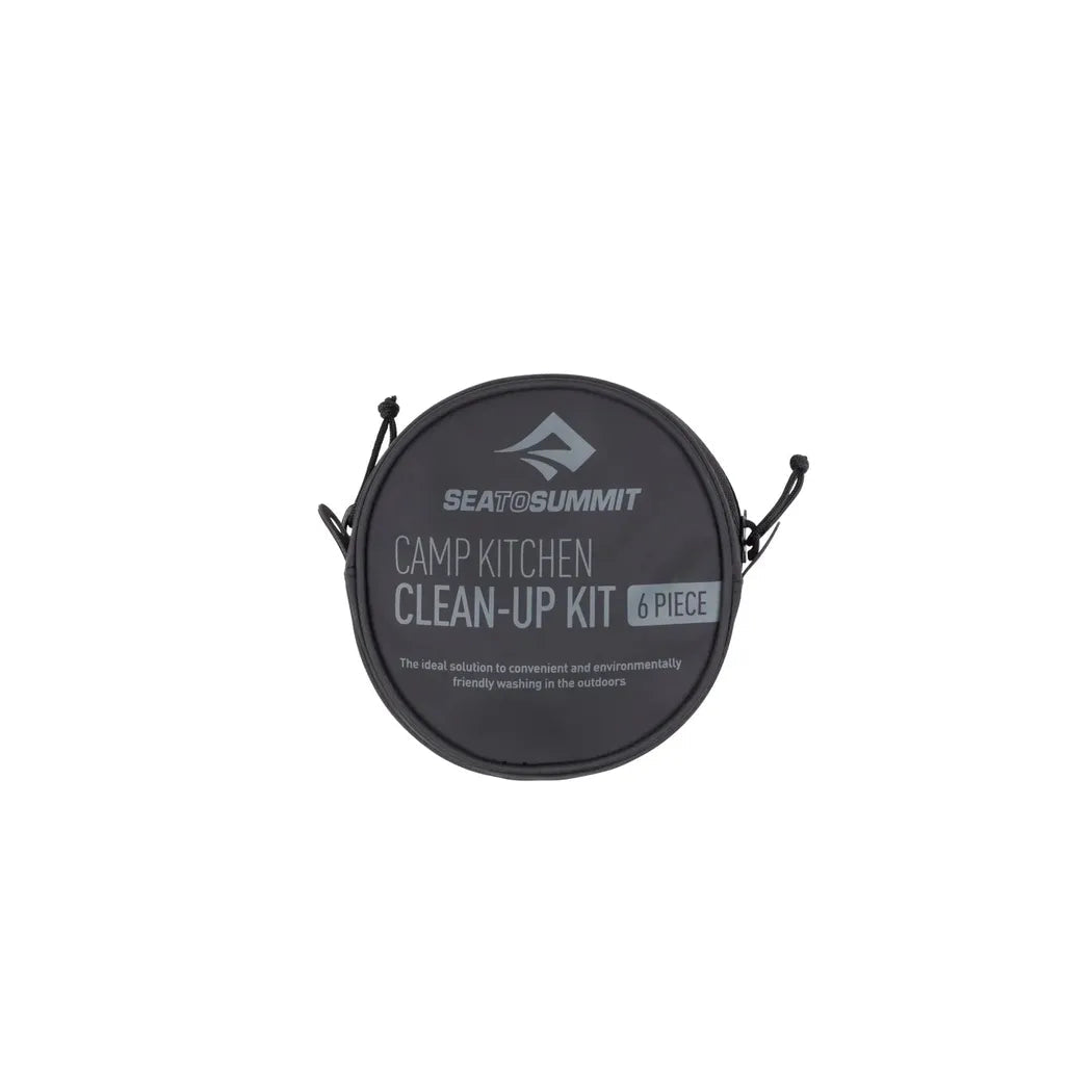 A round Sea To Summit Camp Kitchen Clean Up Kit in charcoal/gray with two black straps on either side against a white background.
