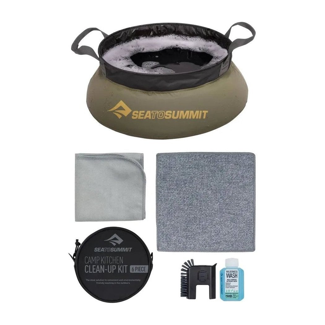A top-down view of the Sea To Summit Camp Kitchen Clean Up Kit - [6 Piece] with its contents laid out on a white background.
