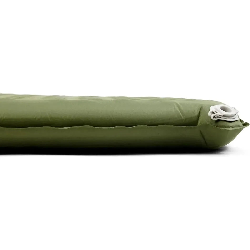 Side view of the Sea To Summit Camp Plus Self Inflating Mat in Regular Green showing the inflation valve against a white background.