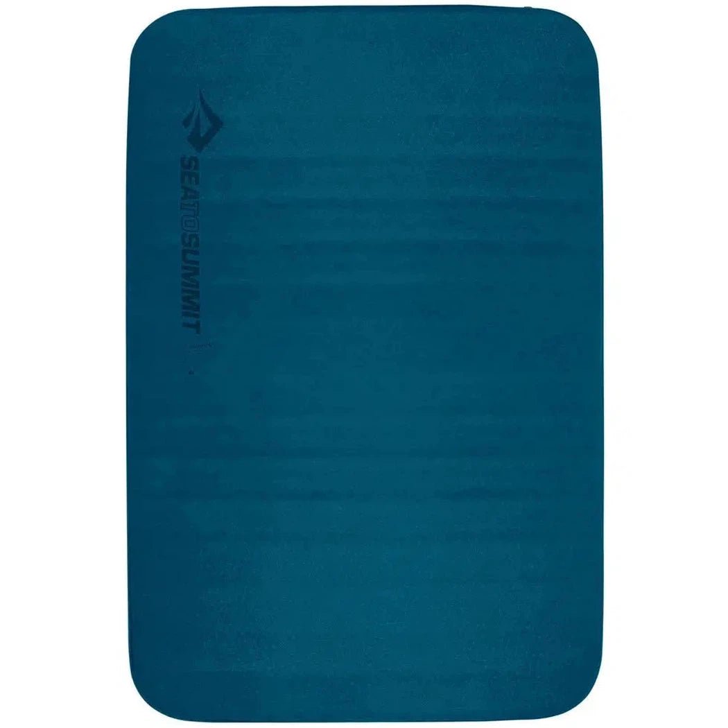 A side view of the Sea To Summit Comfort Deluxe Sl Mat-Double in blue against a white background.