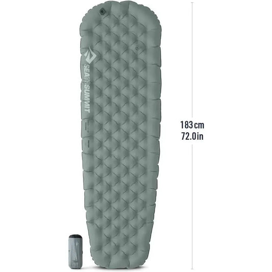 Side view of the Sea To Summit Ether Light XR Insulated ASC Mat in Regular color showing the quilted design and compacted size next to the inflation valve.