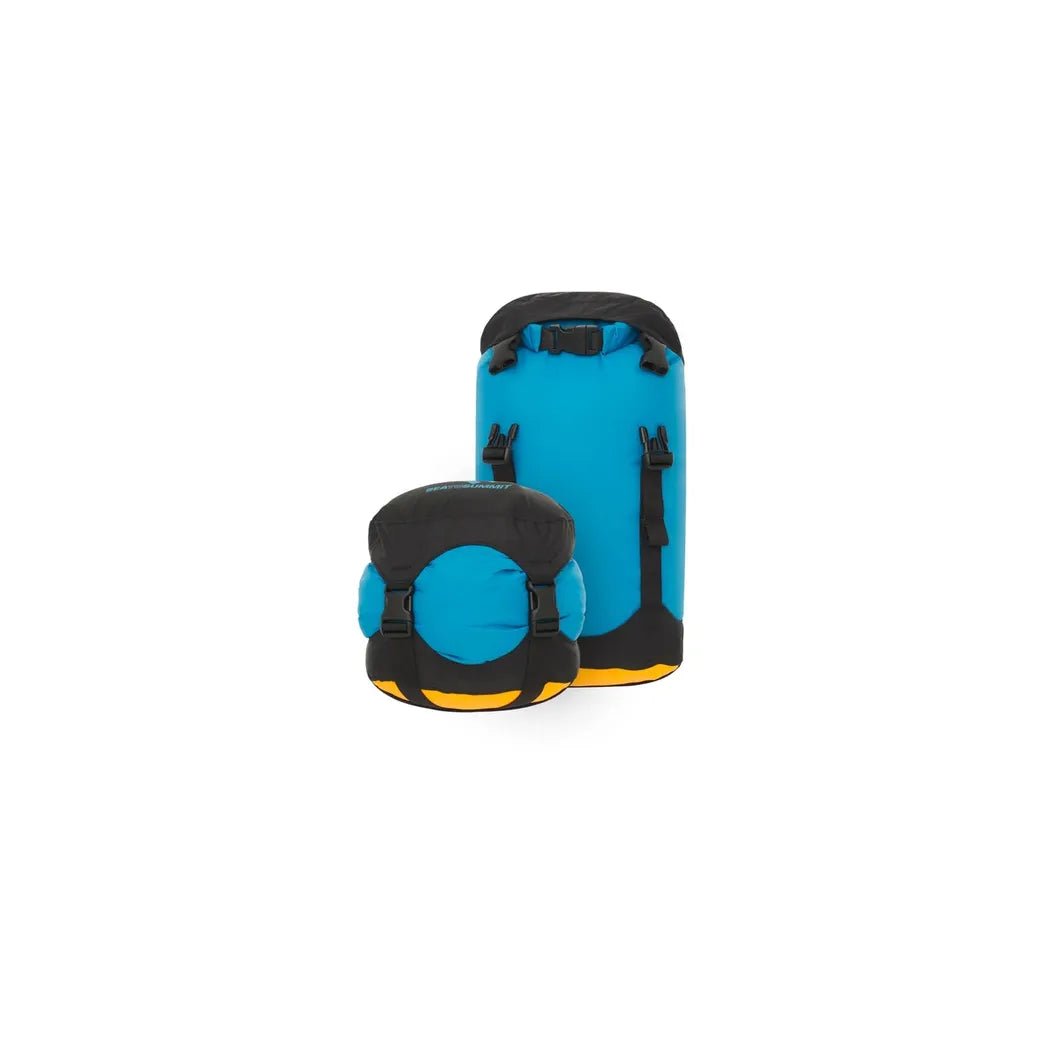 Side view of the Sea To Summit Evac Lightweight Compression Dry Bag in High Rise showing the roll top closure and straps against a white background.