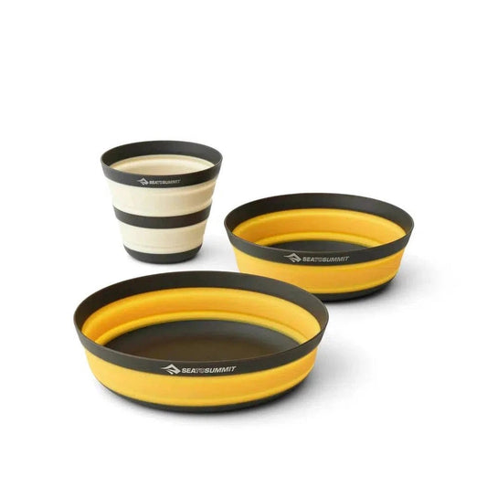 Three Sea To Summit Frontier UL Collapsible Dinnerware Set Multi pieces in charcoal and yellow sit on a white background.