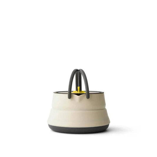 A front view of the Sea To Summit Frontier UL Collapsible Kettle - 1.1L with charcoal handles and base against a white background.