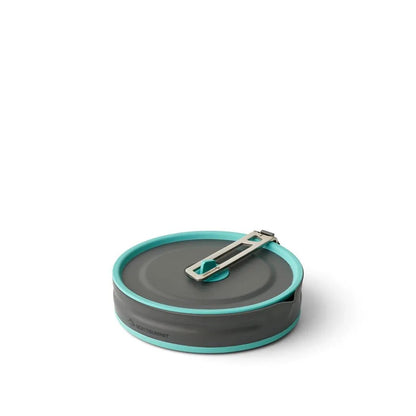 A close-up of the Sea To Summit Frontier UL Collapsible Pouring Pot - 2.2L in AquaSea Blue, showing the collapsible lid and pouring spout against a white background.