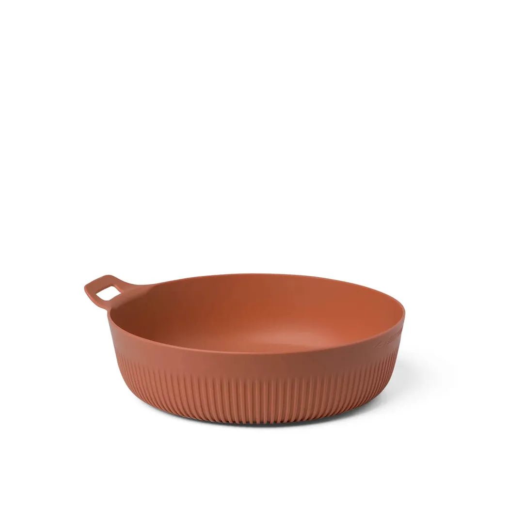 A side view of the Sea To Summit Horizon Bowl - L in Bombay color showing the ribbed base and handle against a white background.