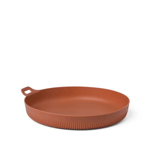 A top-down view of the Sea To Summit Horizon Plate - L in Bombay color with a handle and ribbed edge, set against a plain white background.