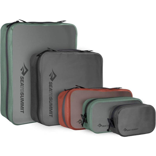 Side view of Sea To Summit Hydraulic Packing Cubes in Jet Black and other colors against a white background.