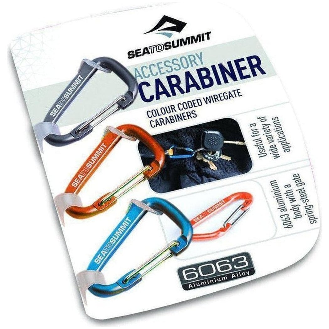 A top-down view of Sea To Summit Accessory Carabiners in charcoal, orange, and blue, showing the 6063 aluminum alloy label and a wiregate feature.