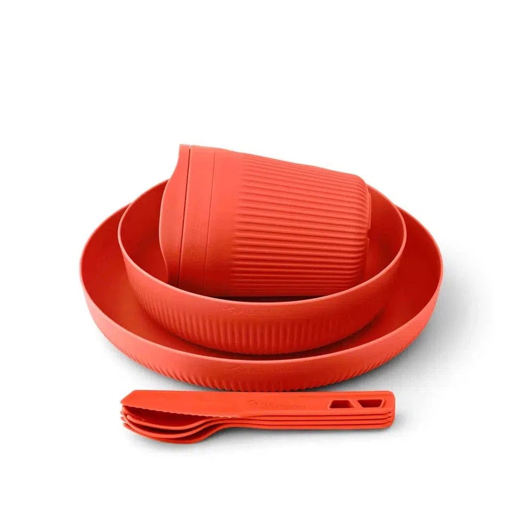 Spicy Orange Sea To Summit Passage 7 Piece 1 Person Camping Dinnerware Set shown from above on a white background.