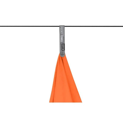 A Baltic Blue Sea To Summit Pocket Towel hangs from a line against a white background.