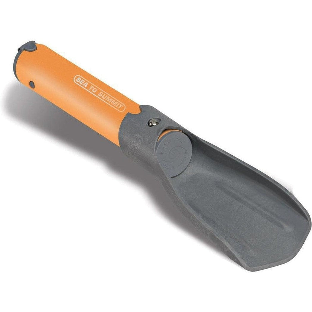 A side view of the Sea To Summit Pocket Trowel Nylon 66 with an orange handle and charcoal/gray blade against a white background.