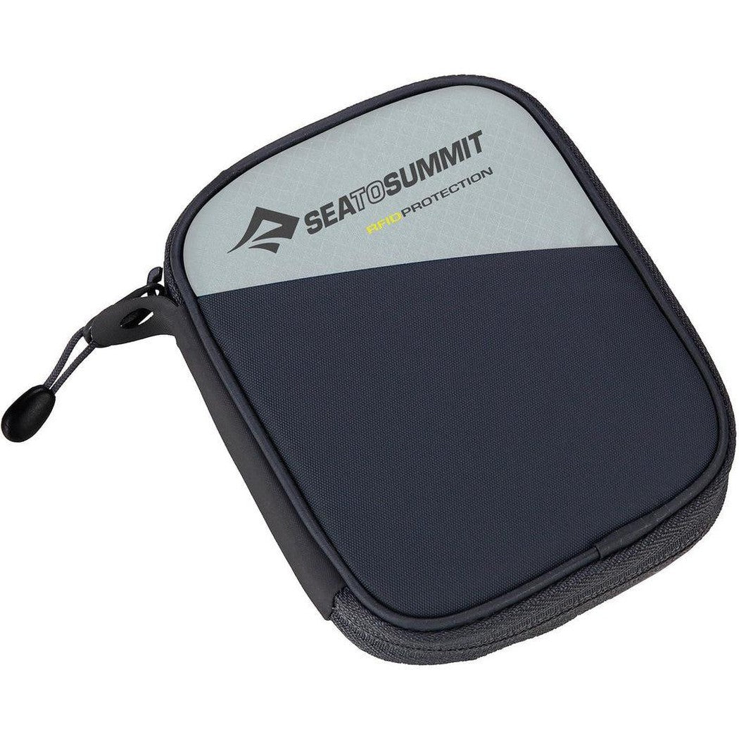 A top-down view of the Sea To Summit RFID Travel Wallet in High Rise Grey with a zipper pull and brand logo visible.