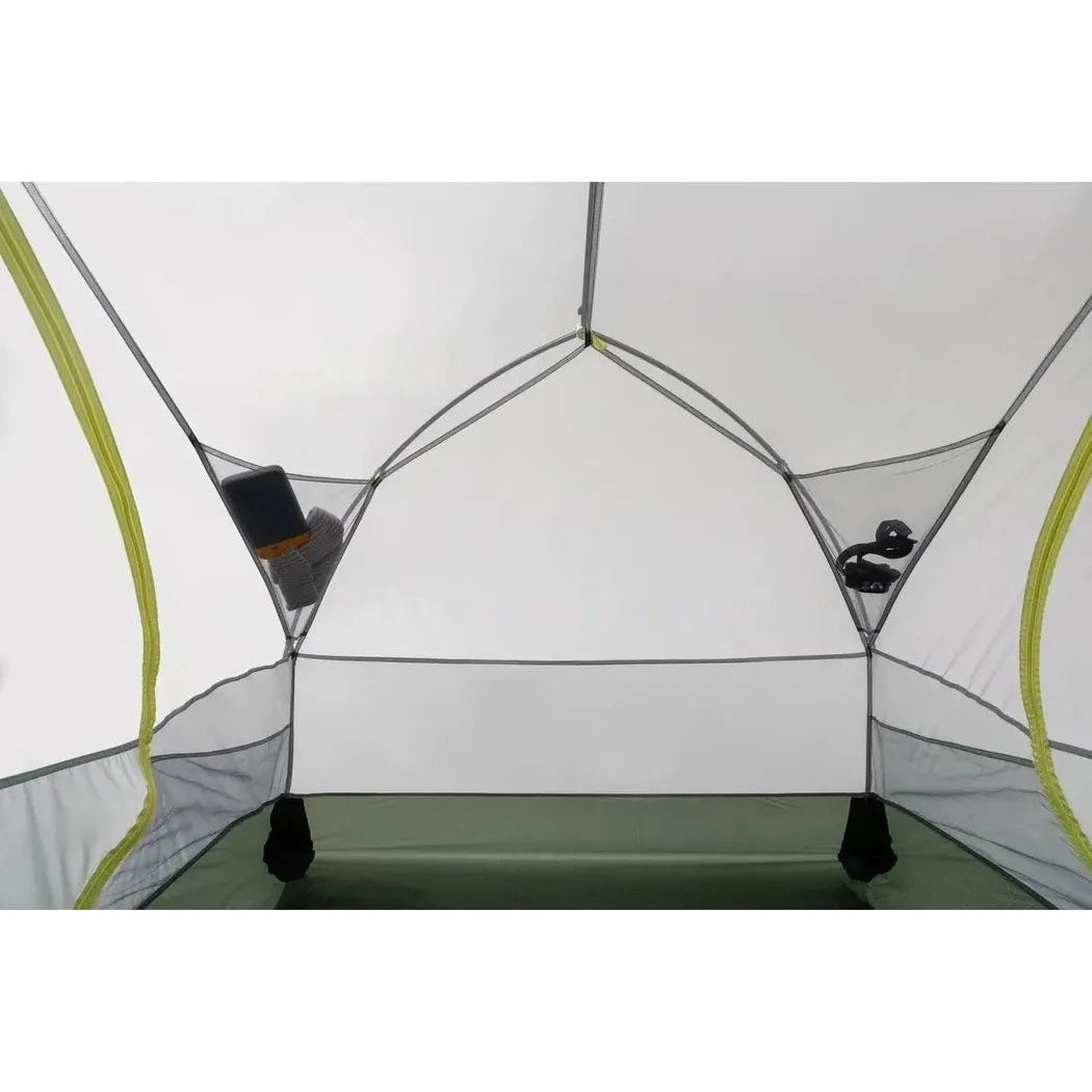 Inside view of the Sea To Summit Telos Evo Tent showing mesh pockets with a book and sunglasses on the walls.