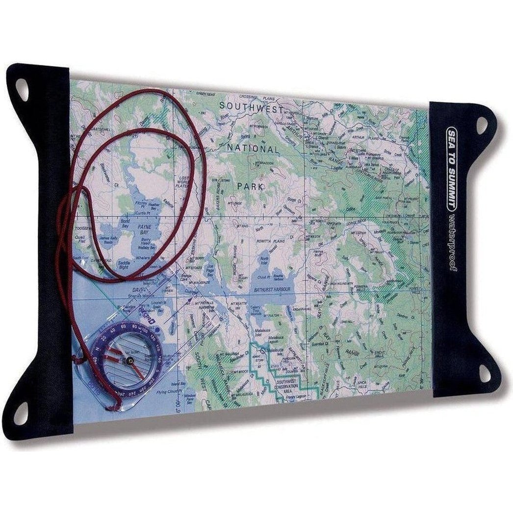 A Sea To Summit TPU Guide Map Case with a compass and red cord on a map of Southwest National Park.