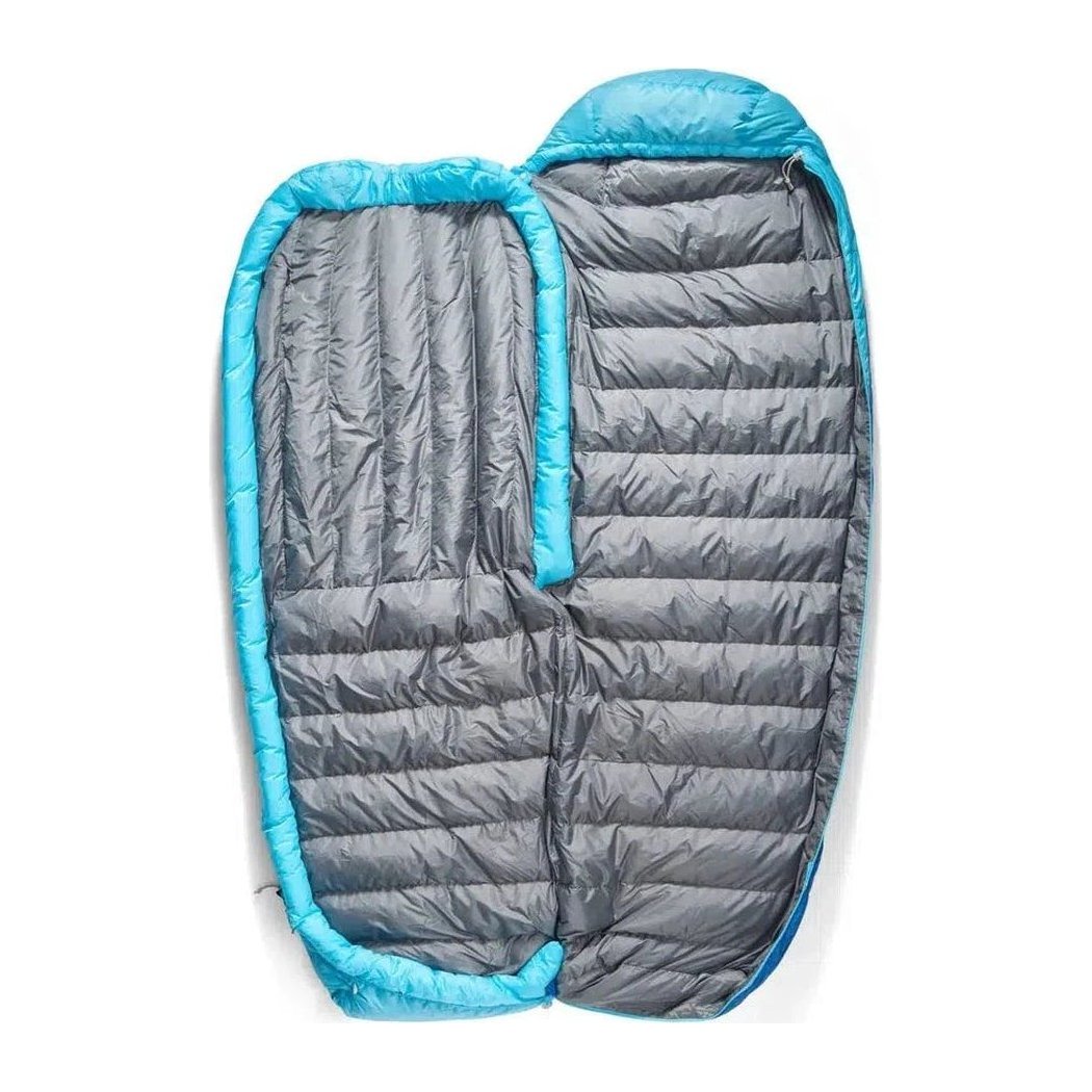 Side view of the Sea To Summit Trek Down Sleeping Bag Unisex 30F | -1C in Snorkel Blue showing the quilted design against a white background.