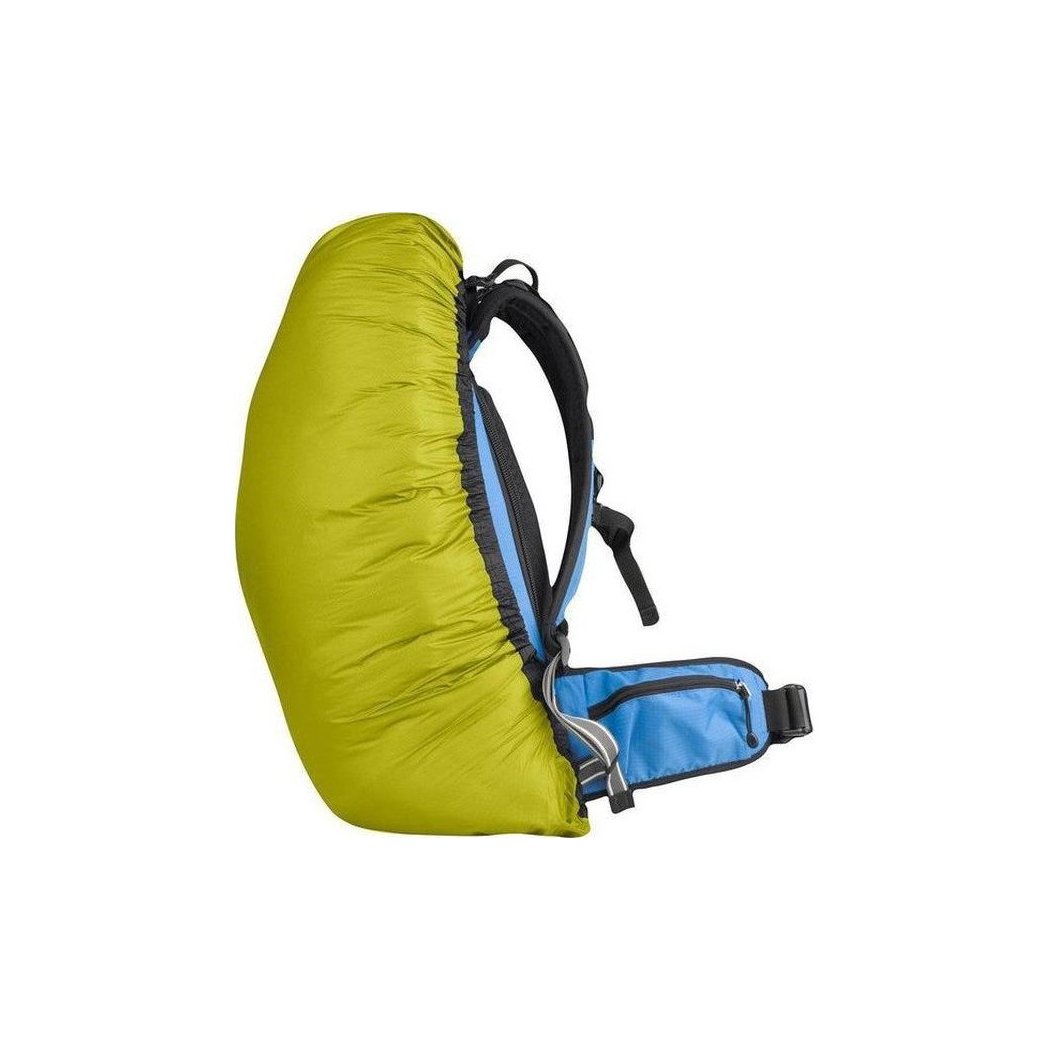 Side view of the Sea To Summit Ultra-Sil Pack Cover in Blue showing the backpack straps and a white background.