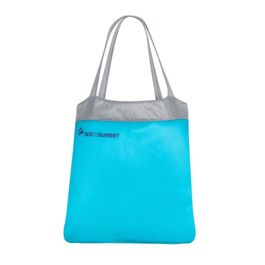 A front view of the Sea To Summit Ultra-Sil Shopping Bag in Atoll Blue with a gray top and white background.