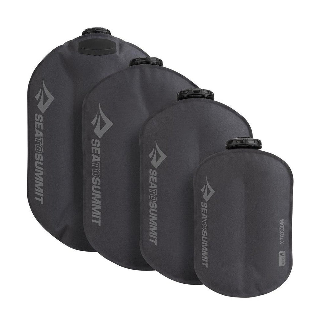 Four Sea To Summit Watercell X hydration bladders in charcoal color, shown from front angle against white background.