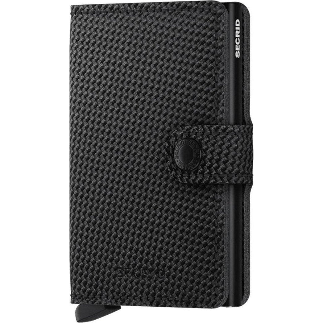 A front view of the SECRID Mini Wallet - Carbon in Black showing the textured surface and secure snap closure.
