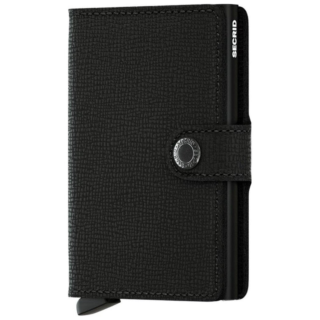 A front view of the SECRID Mini Wallet - Crisple in Black showing the snap closure and textured surface.