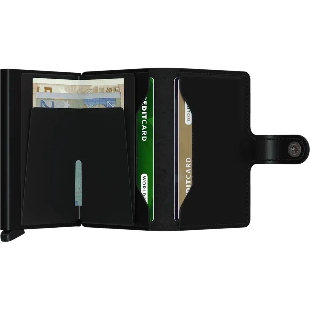 A black SECRID Mini Wallet - Matte open to show cards and cash against a white background.