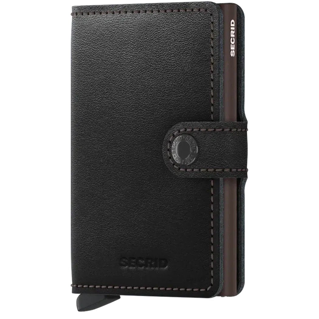 A front view of the SECRID Mini Wallet - Original in Black showing the snap closure and brand name embossed on the front.