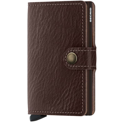 A front view of the SECRID Mini Wallet - Veg in Black showing the metal snap closure and stitching against a white background.