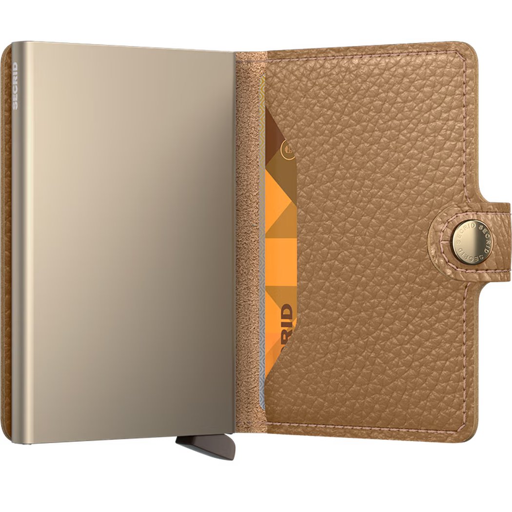 A side view of the SECRID Miniwallet Pebble in Cappuccino showing the snap closure and card slot.