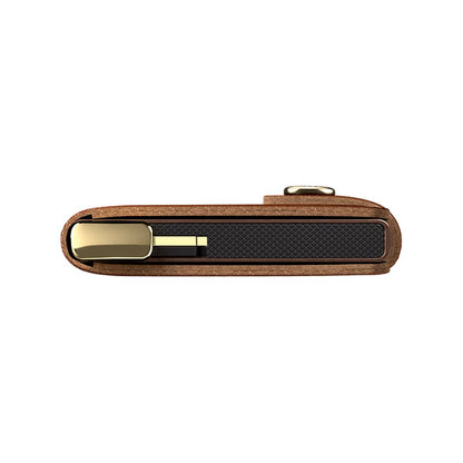 A top-down view of the SECRID Premium Miniwallet Emboss Lines + in Cognac showing the embossed black panel and gold-toned clip against a white background.