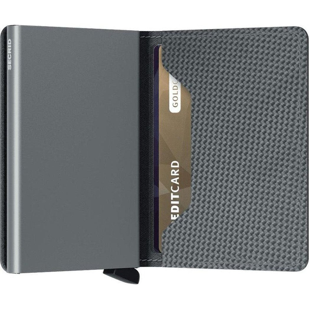 Side view of the SECRID Slim Wallet - Carbon showing a credit card slot and charcoal interior against a white background.