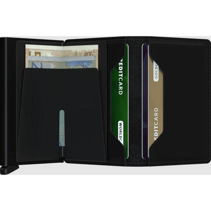 A black SECRID Slim Wallet - Matte open to show card slots and a cash pocket.