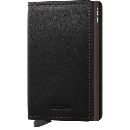 A front view of the SECRID Slim Wallet - Original in Black showing the brand name embossed on the front and a brown accent stripe on the side.