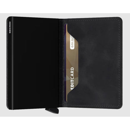 Open view of the SECRID Slim Wallet - Vintage in Black showing a card slot and the brand name on the left side.