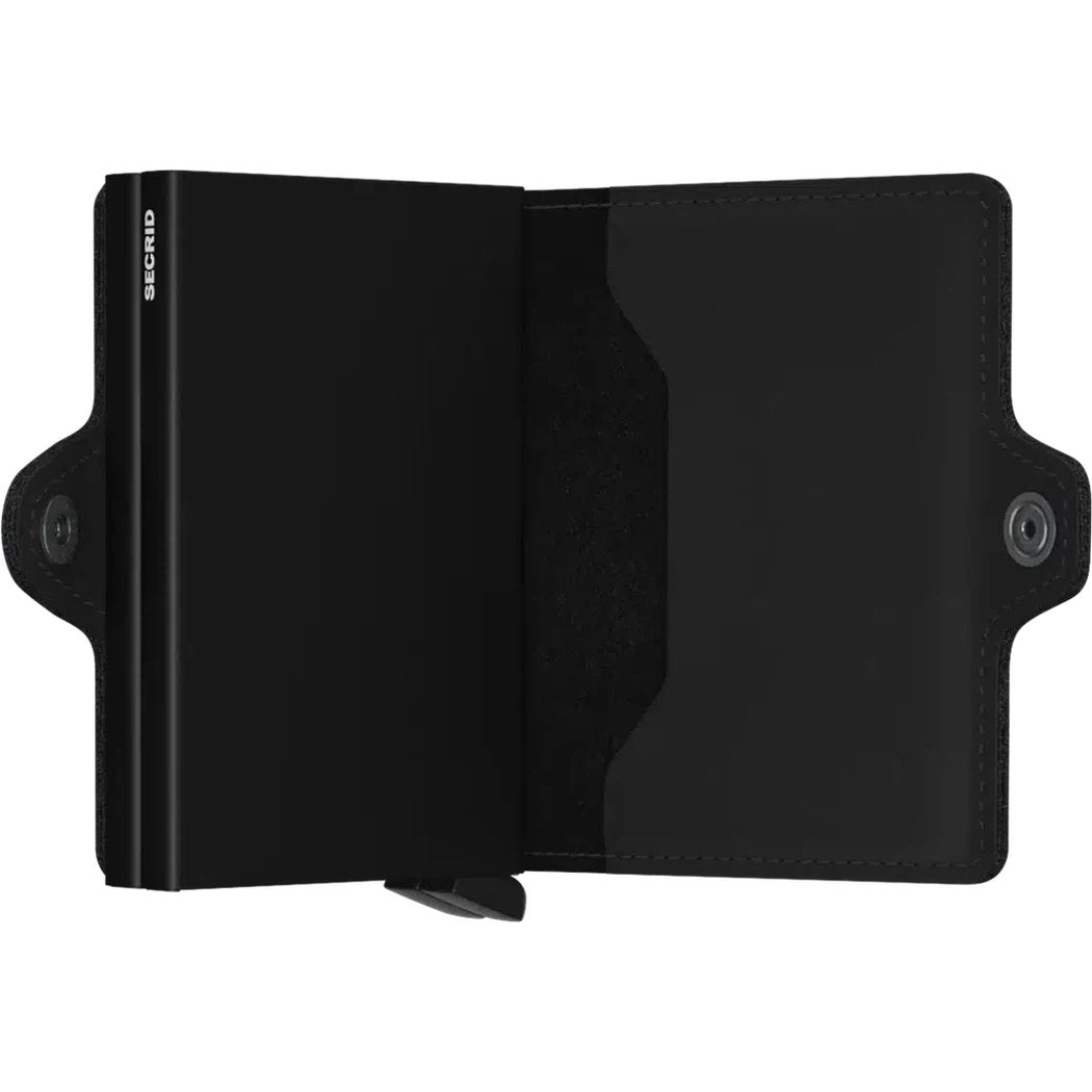 A black SECRID Twin Wallet - Matte open to show its interior and snap closure.