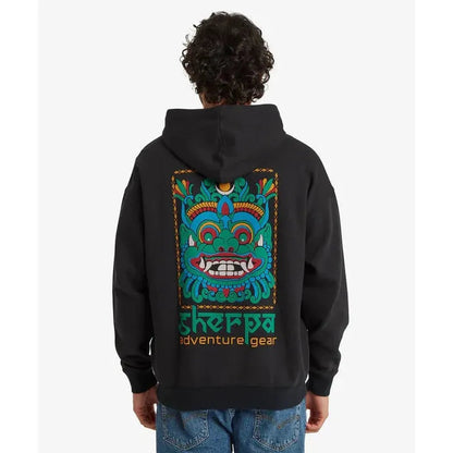 Back view of the Sherpa Adventure Gear Men's Tarcho Mask Hoodie in Black on a model wearing blue jeans.