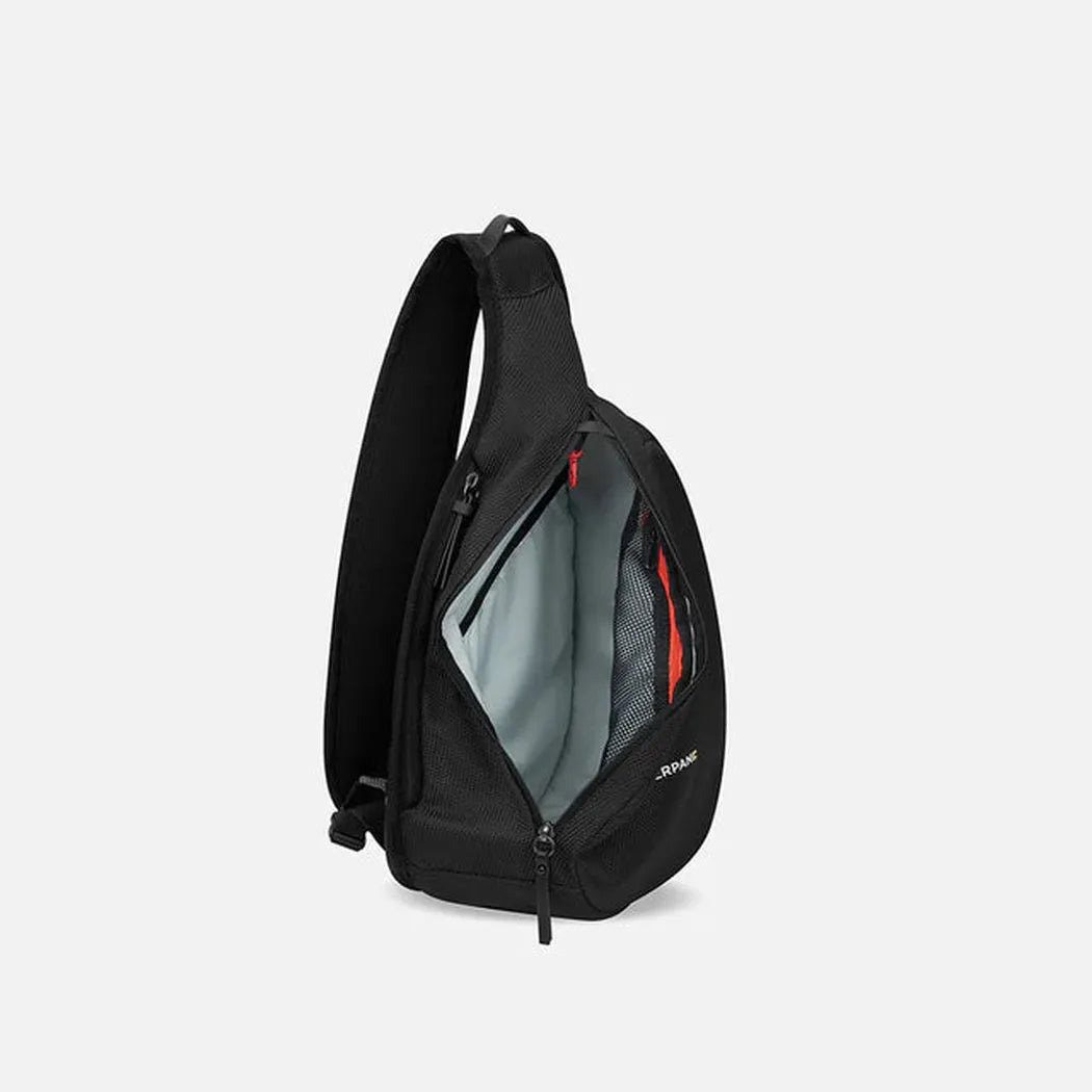Side view of the Sherpani Esprit AT Carbon bag showing the open main compartment against a white background.