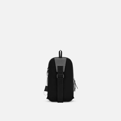 Back view of the Sherpani Metro AT in Aloe Mist showing the front strap and zipper pocket against a white background.