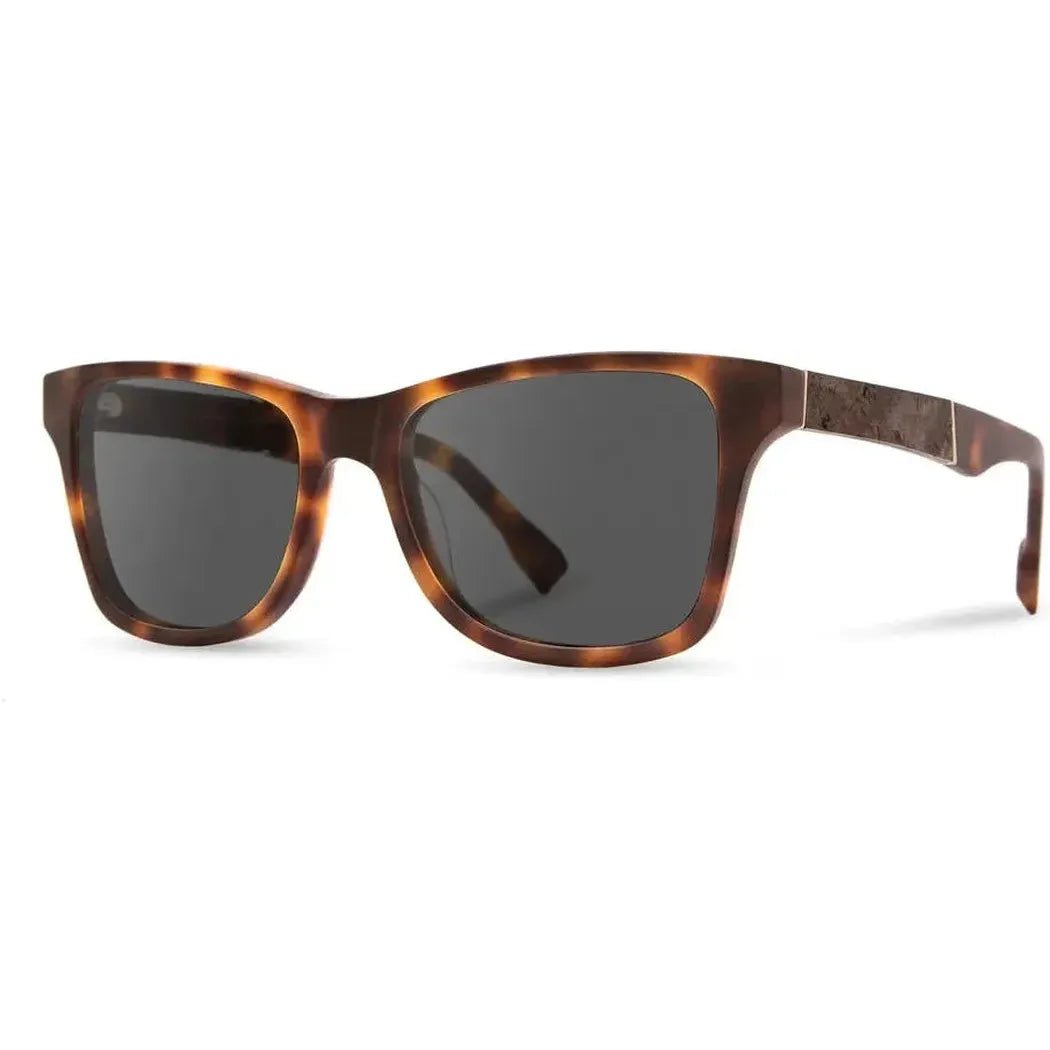 Side view of the Shwood Canby XL sunglasses with tortoiseshell frames and dark lenses against a white background.