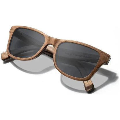Side view of the Shwood Canby sunglasses in Distressed Dark Walnut with charcoal lenses against a white background.