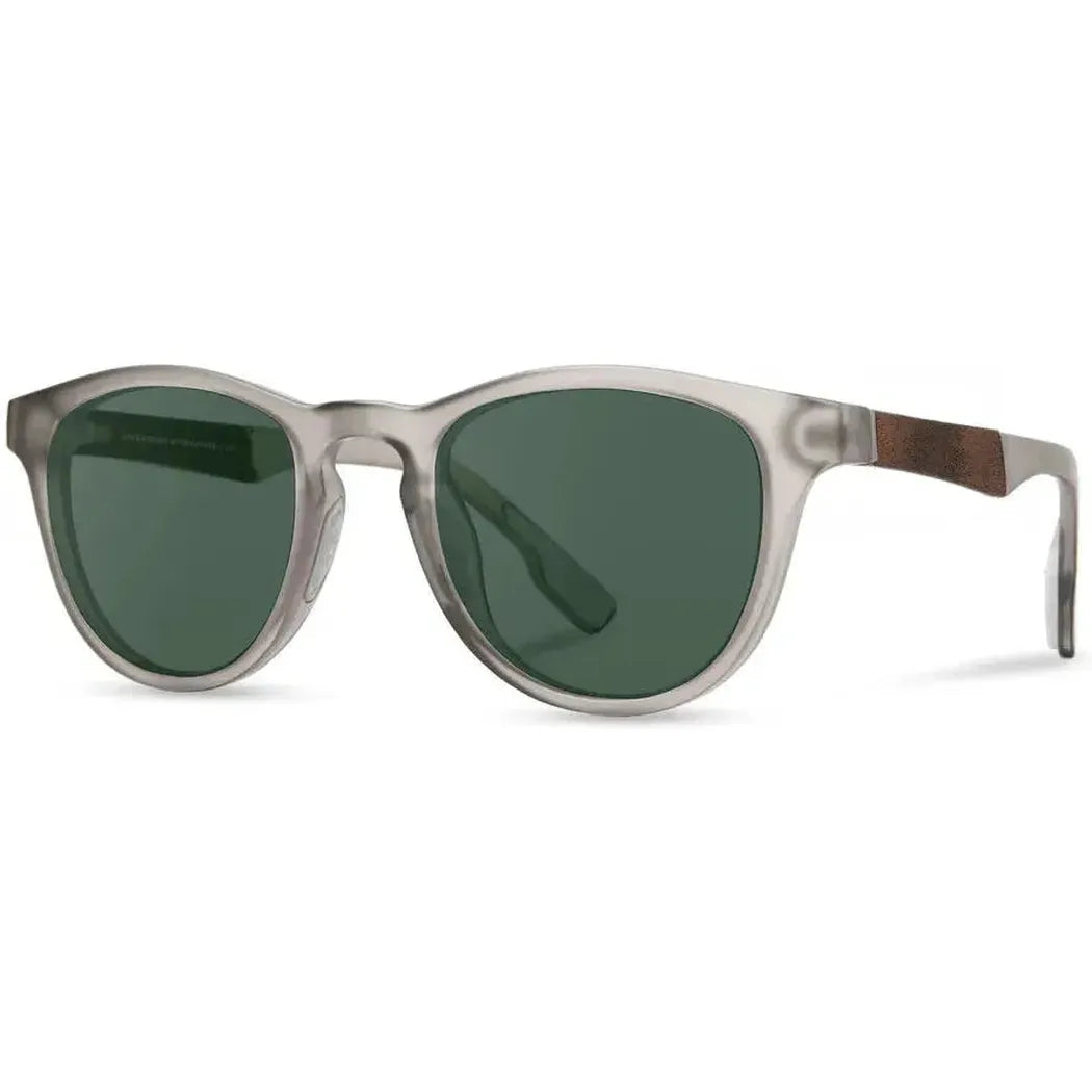 Side view of the Shwood Francis ACTV sunglasses with a white background and a wooden temple detail.