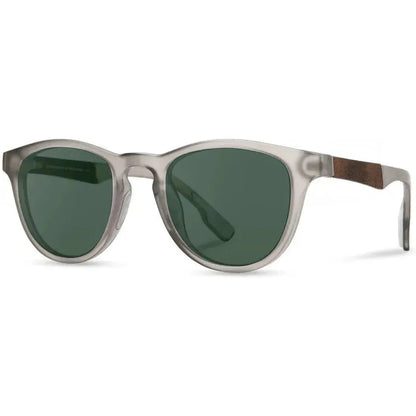 Side view of the Shwood Francis ACTV sunglasses with a white background and a wooden temple detail.