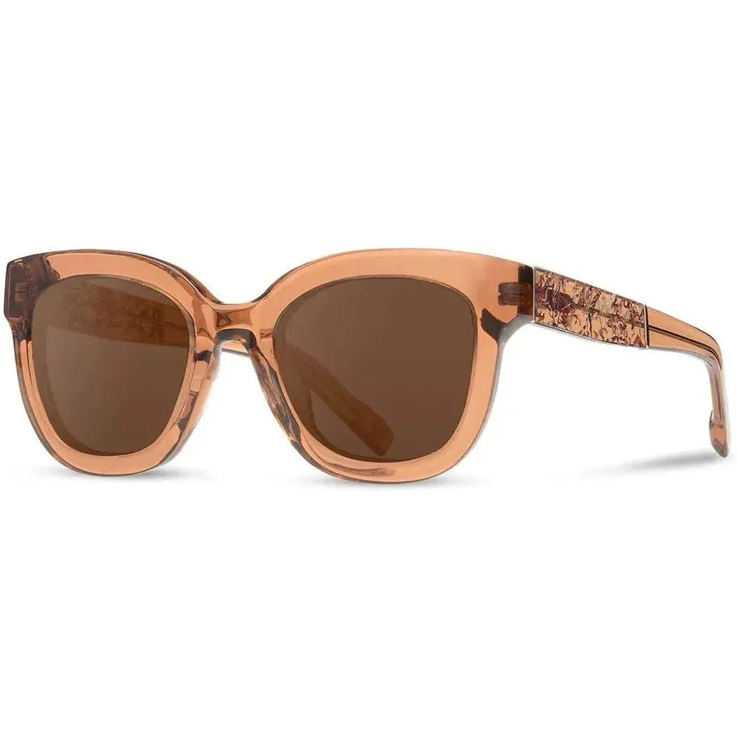 Side view of the Shwood Lorane sunglasses with copper frames and rose flower detail on the temples, set against a white background.