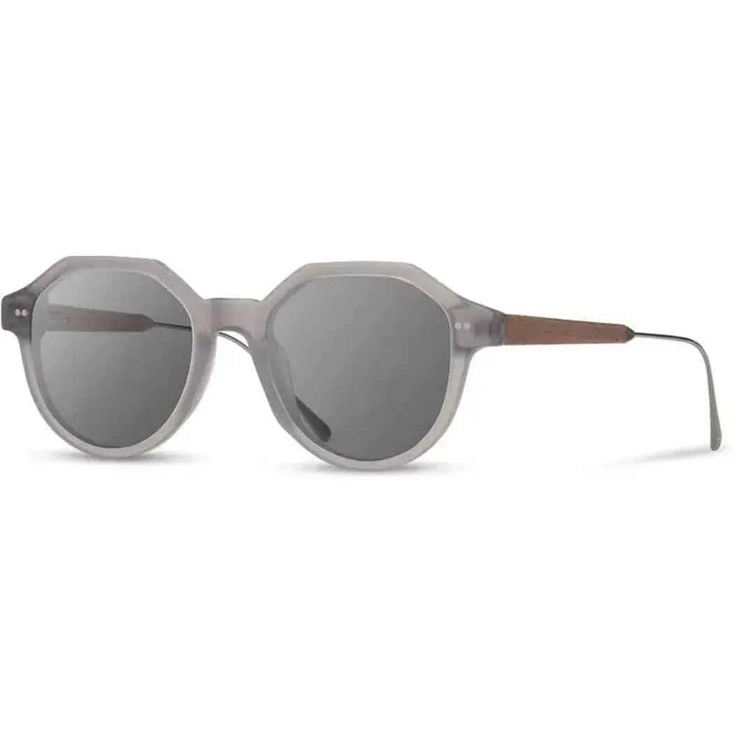 Side view of the Shwood Powell sunglasses in Copper Crystal & Copper // Ebony with dark lenses and wooden temple accents against a white background.