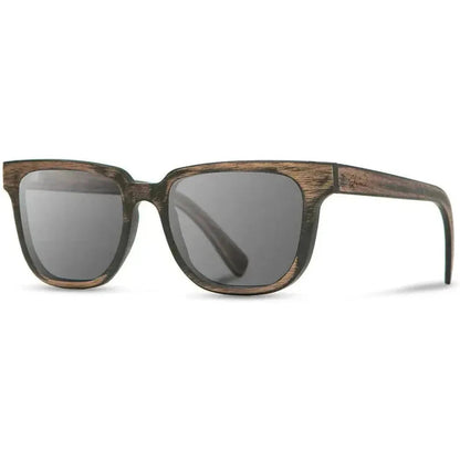 Side view of the Shwood Prescott sunglasses in Distressed Dark Walnut with gray lenses against a white background.